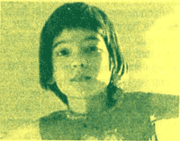 a grainy photograph of a child with arms spread and a slight smile, printed with green ink on yellow paper
